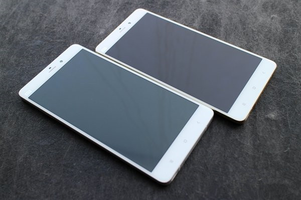 小米Note顶配开箱图赏:土豪金边框大亮